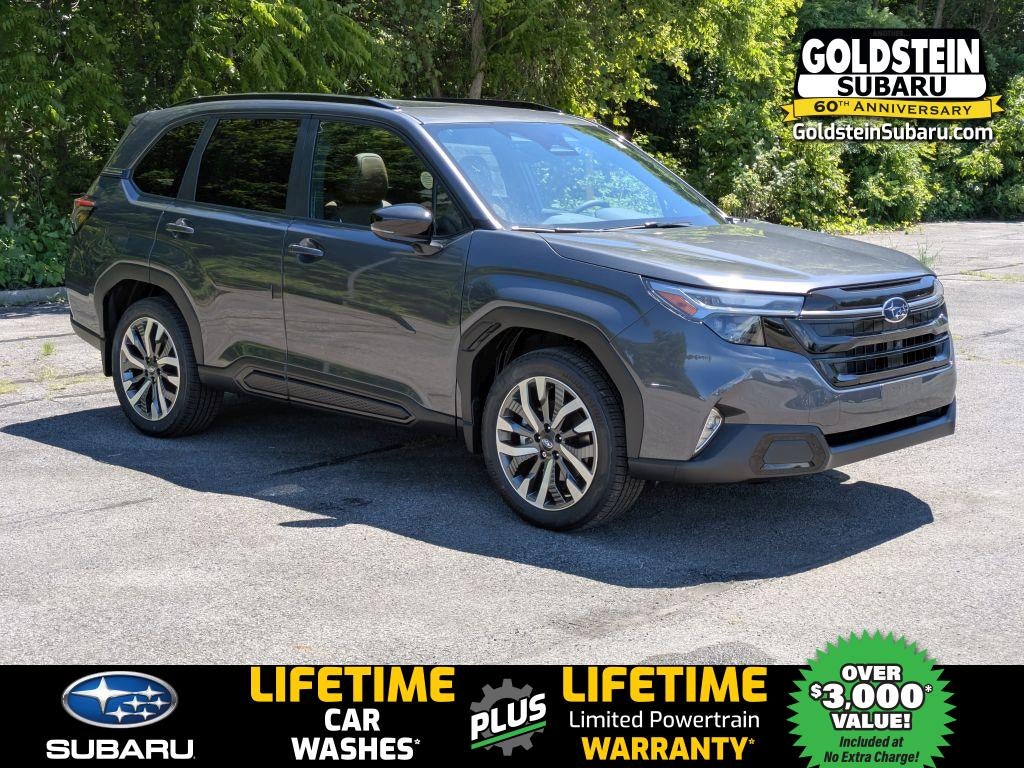 2026 Subaru FORESTER Touring in Magnetite Gray Metallic — front three-quarter view