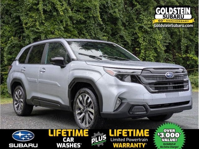 2026 Subaru FORESTER Touring in Ice Silver Metallic — front three-quarter view