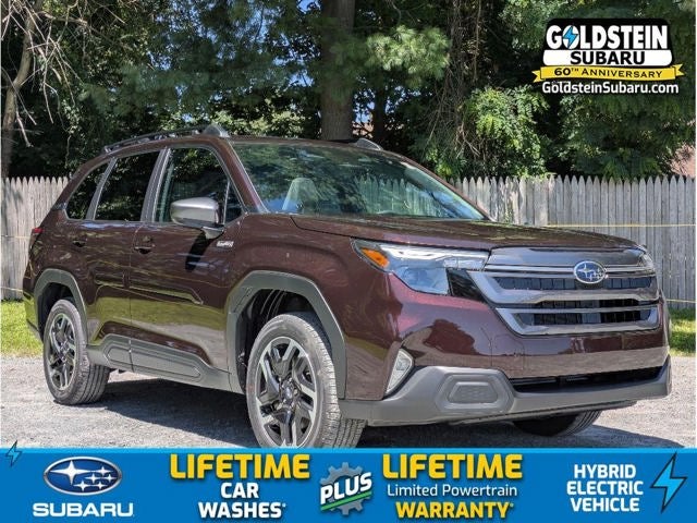 2026 Subaru FORESTER Premium Hybrid in Dark Mahogany Pearl — front three-quarter view