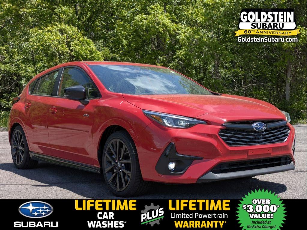 2026 Subaru IMPREZA RS in Pure Red — front three-quarter view
