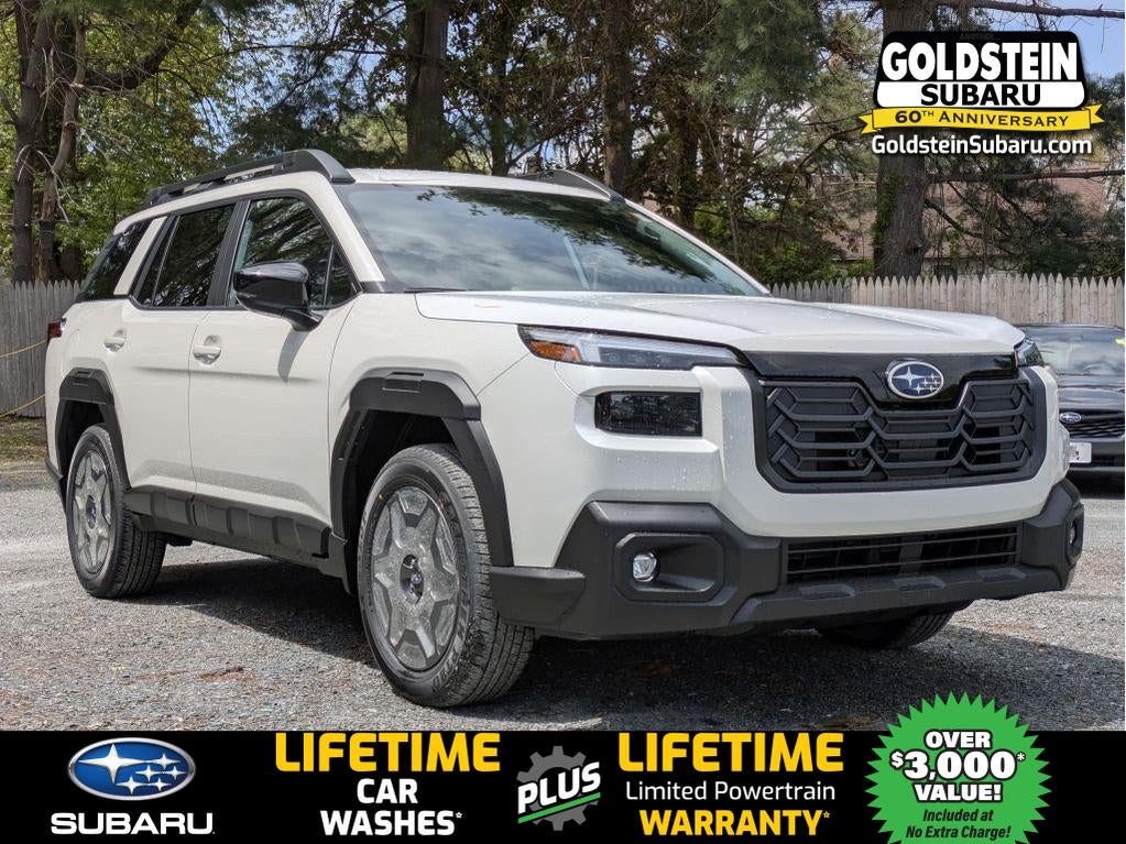 2026 Subaru OUTBACK Premium in Crystal White Pearl — front three-quarter view