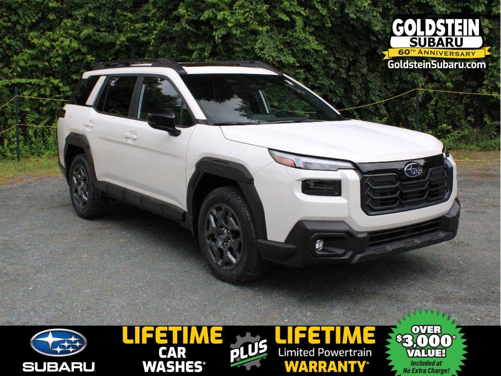 2026 Subaru OUTBACK Premium in Crystal White Pearl — front three-quarter view