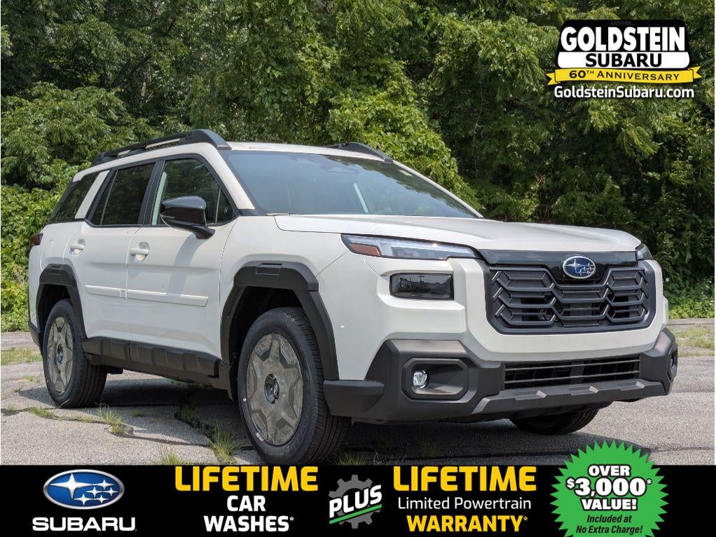 2026 Subaru OUTBACK Premium in Crystal White Pearl — front three-quarter view