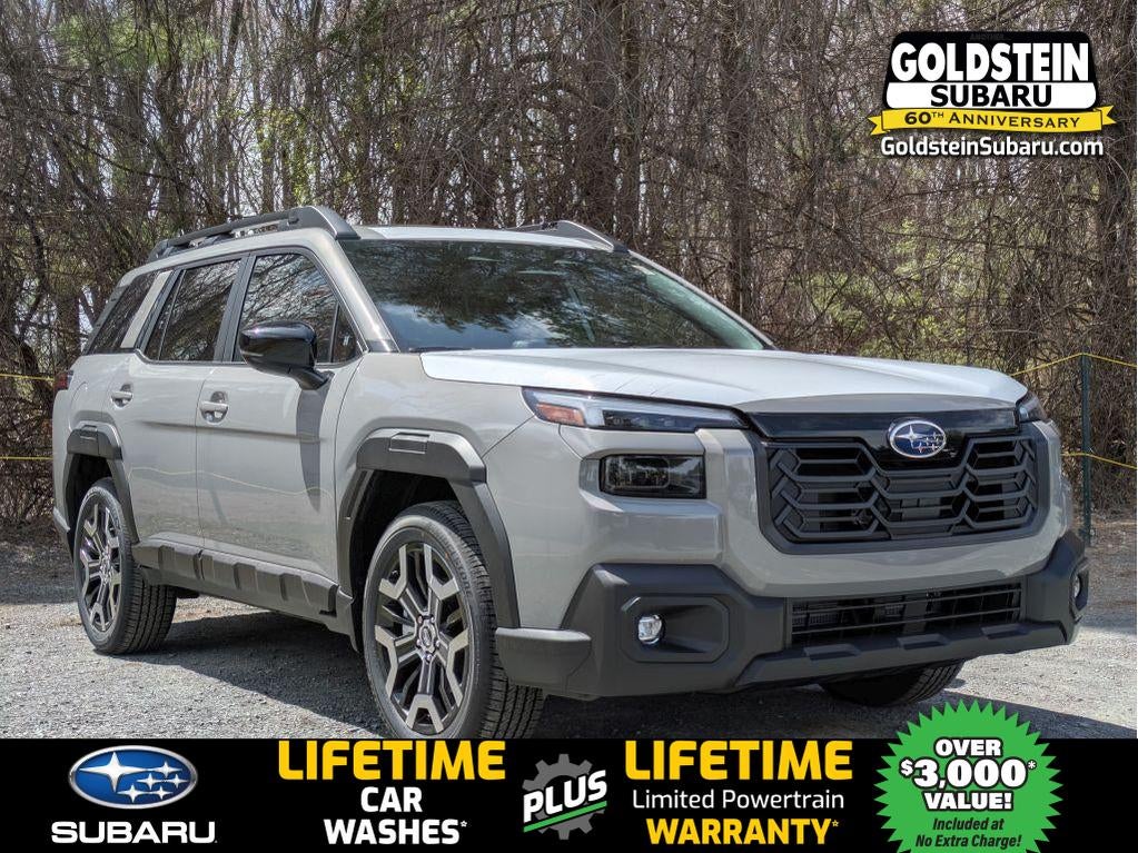 2026 Subaru OUTBACK Touring XT in River Rock Pearl — front three-quarter view