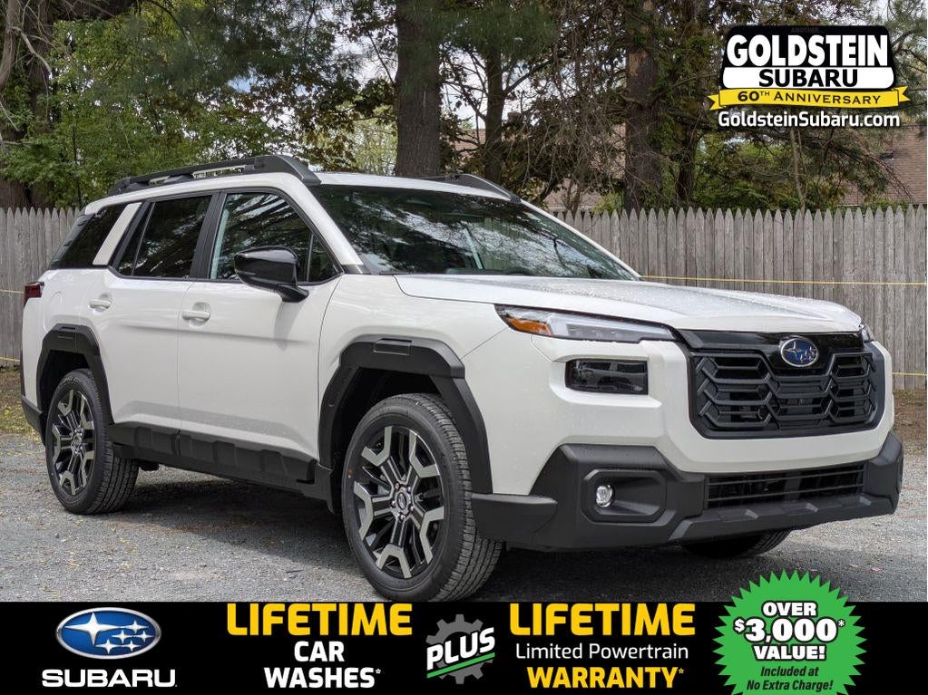 2026 Subaru OUTBACK Touring XT in Crystal White Pearl — front three-quarter view