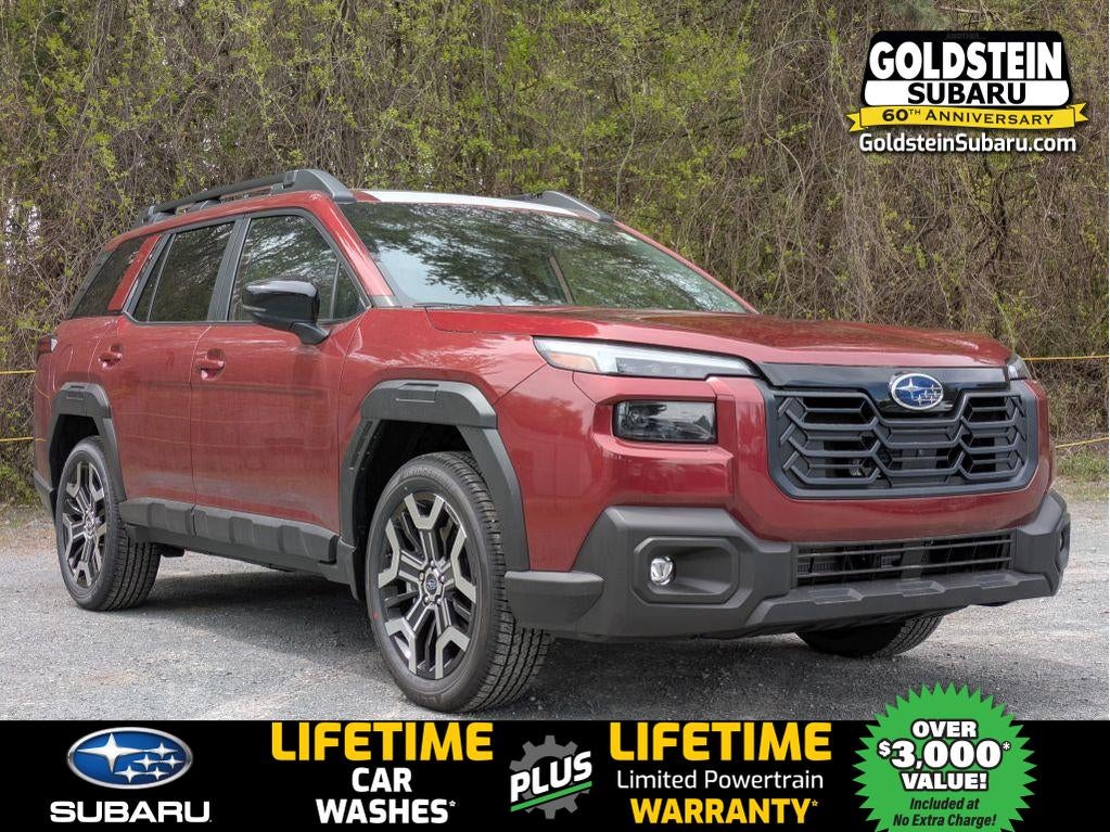 2026 Subaru OUTBACK Touring XT in Crimson Red Pearl — front three-quarter view
