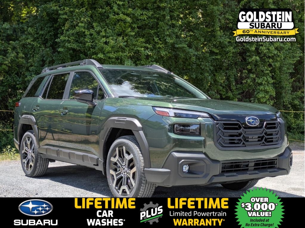 2026 Subaru OUTBACK Touring XT in Deep Emerald Green Pearl — front three-quarter view