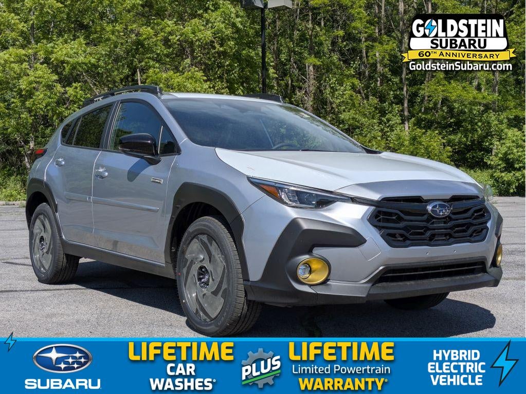 2026 Subaru CROSSTREK Sport Hybrid in Ice Silver Metallic — front three-quarter view