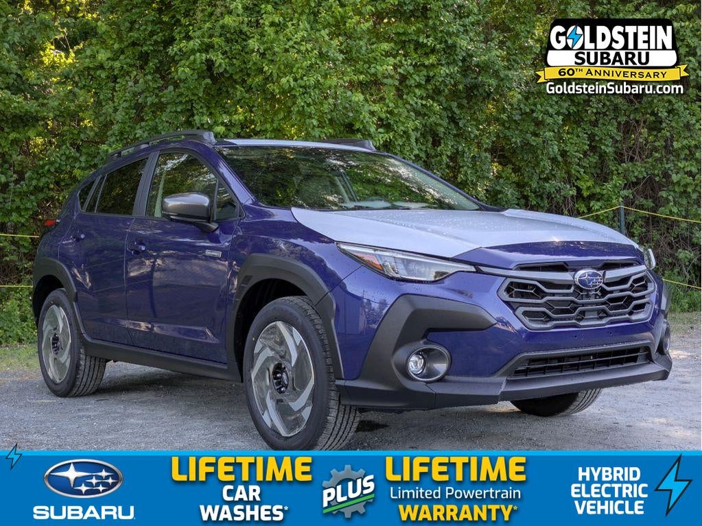 2026 Subaru CROSSTREK Limited Hybrid in Sapphire Blue Pearl — front three-quarter view