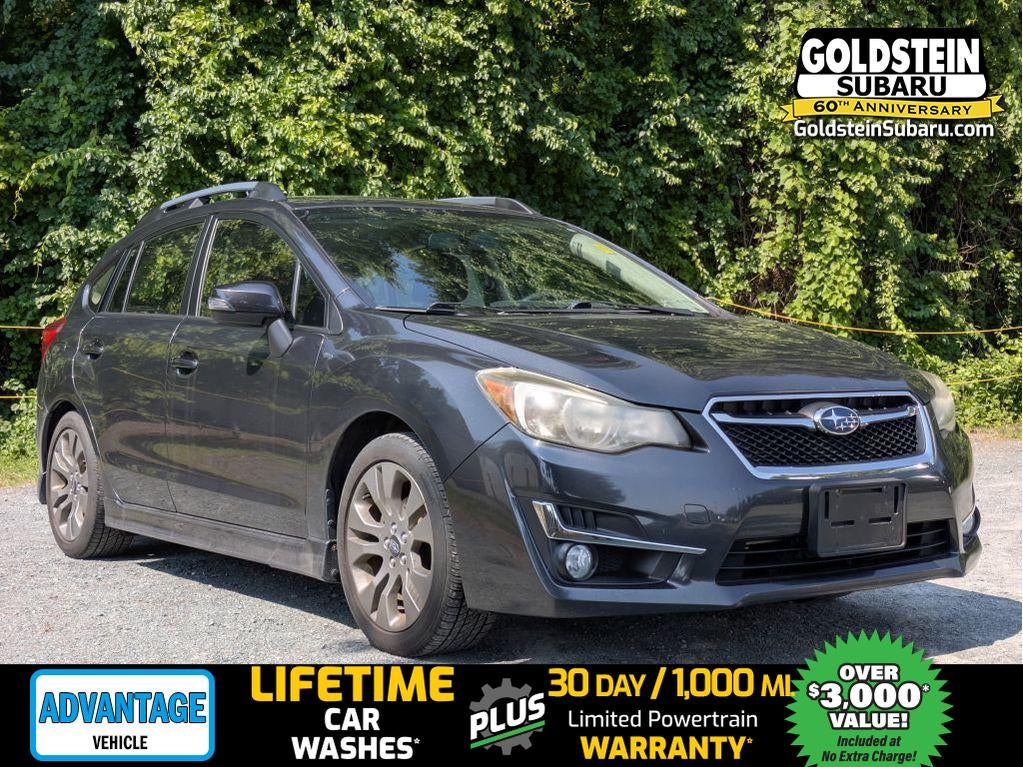 2016 Subaru Impreza 2.0i Sport Premium in Dark Gray Metallic — front three-quarter view