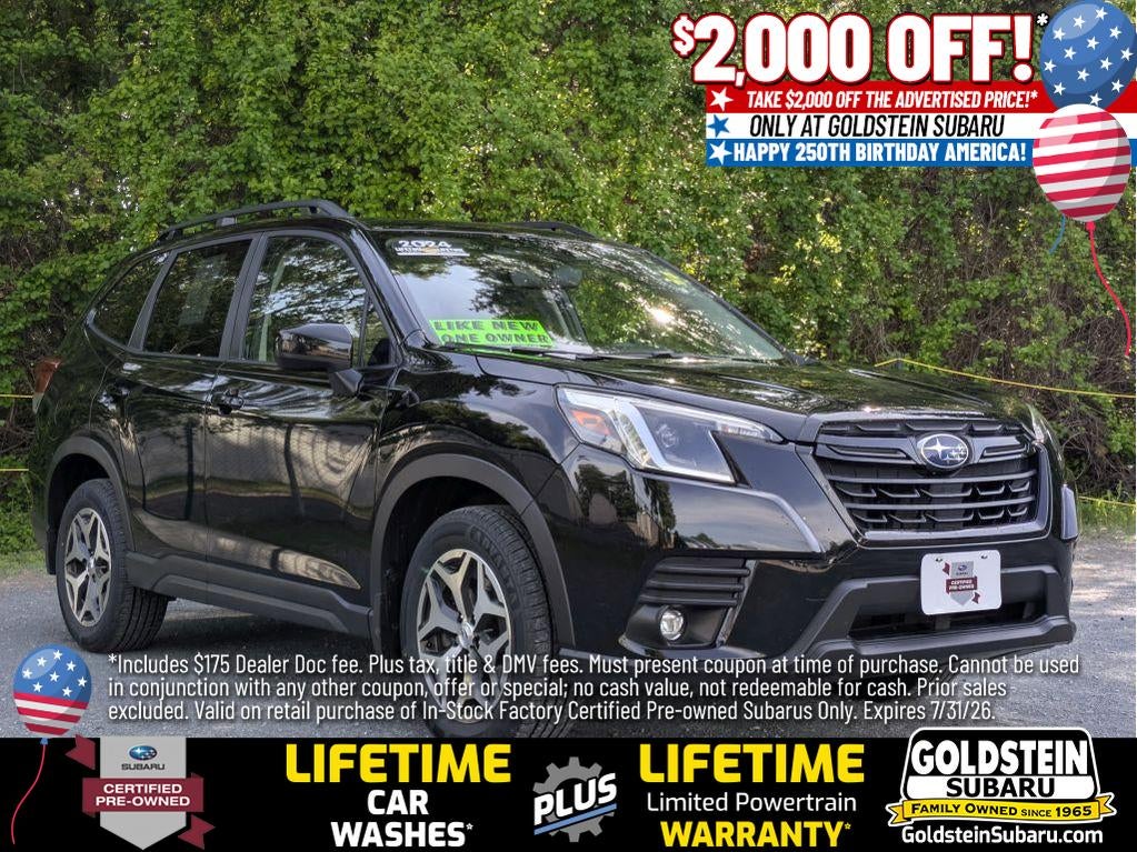 2024 Subaru Forester Premium in Crystal Black Silica — front three-quarter view